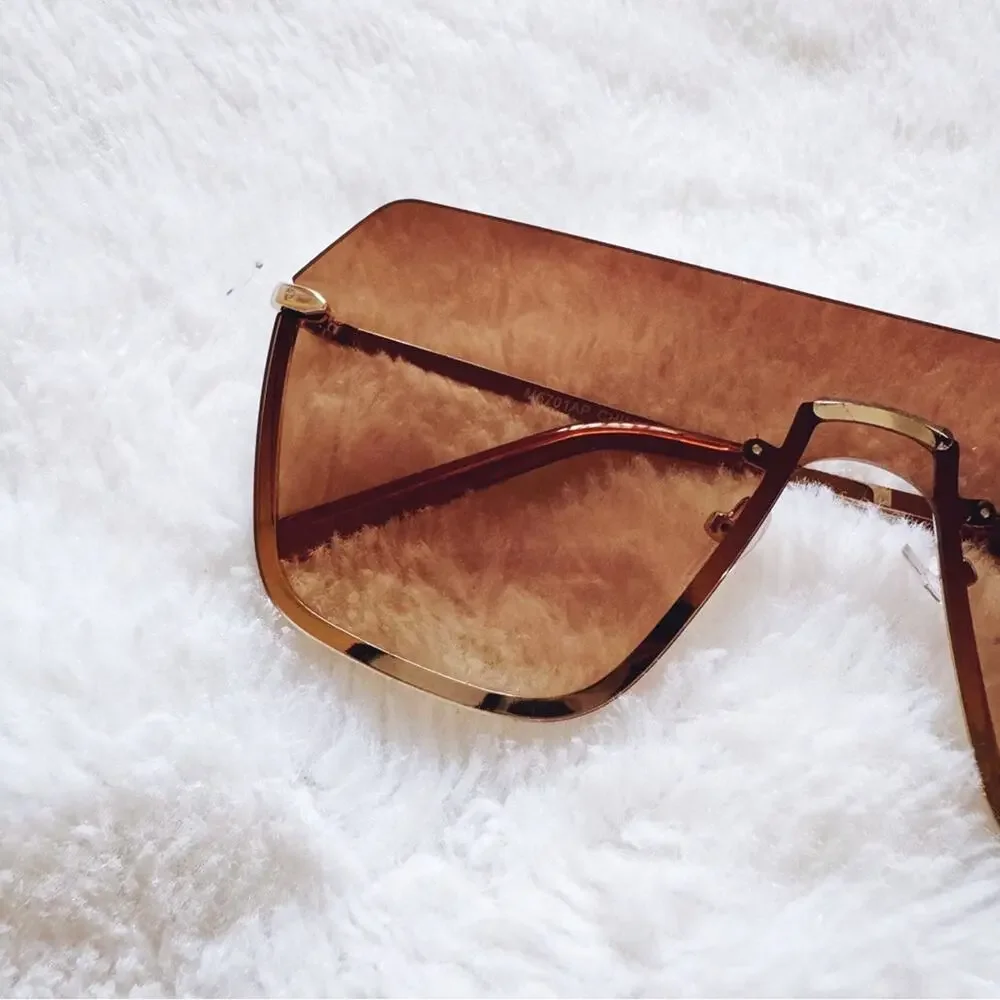 Kalia Clear Brown Rimless Sleek Sunglasses